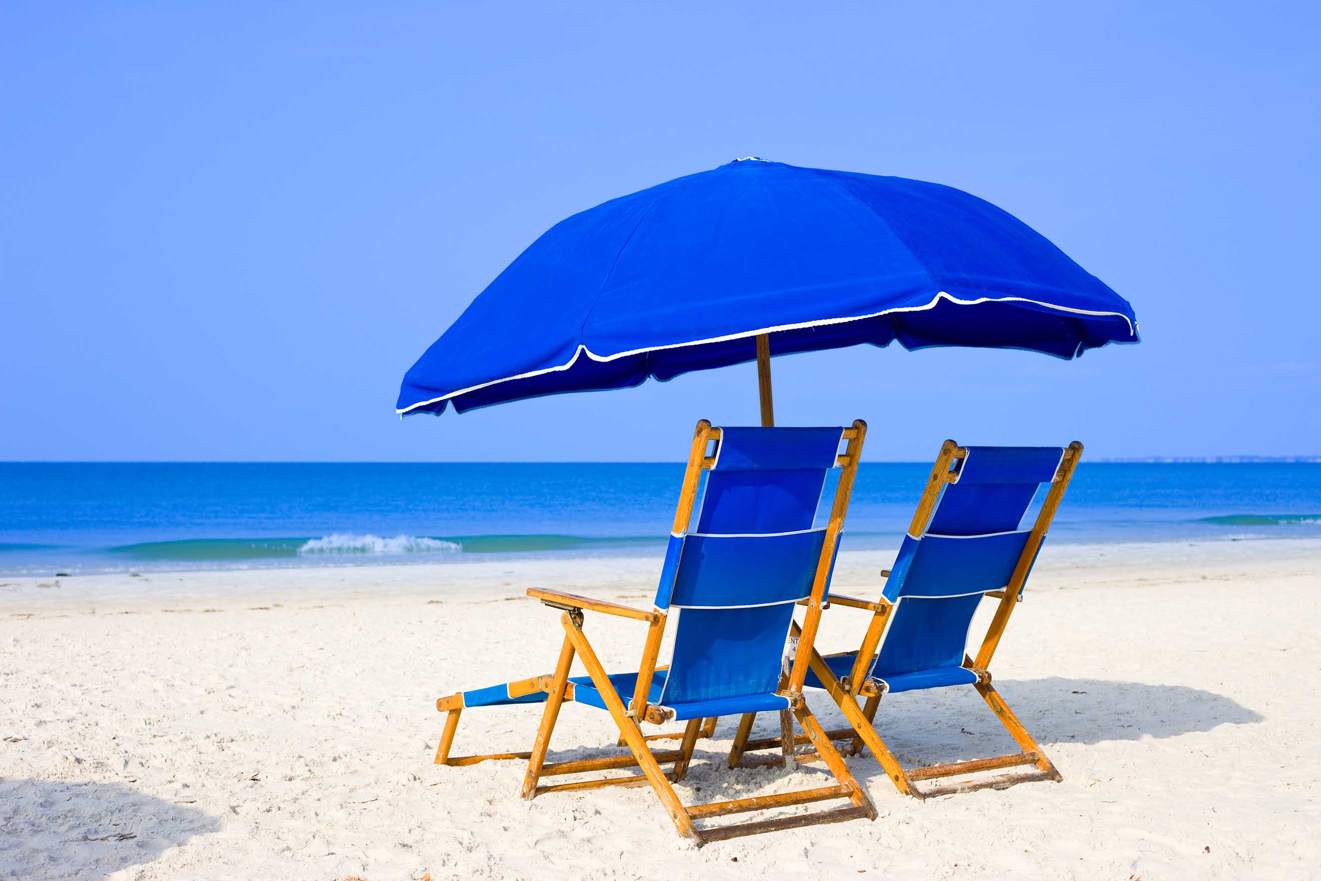 Blue Chairs & Umbrella at Beach