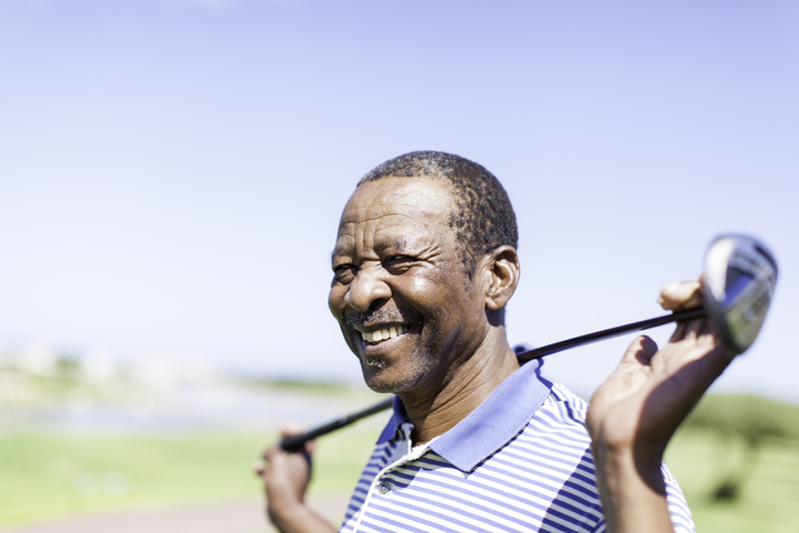 A golfer enjoying a fall day